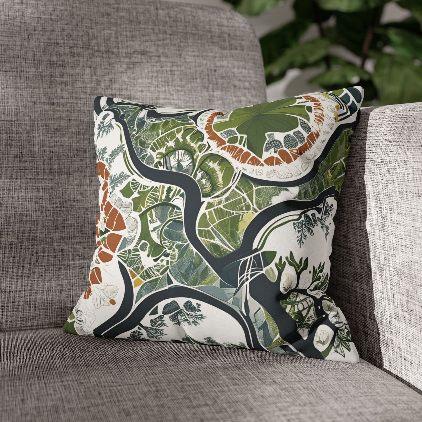 Botanical art pillowcase with abstract nature design pattern on a gray couch