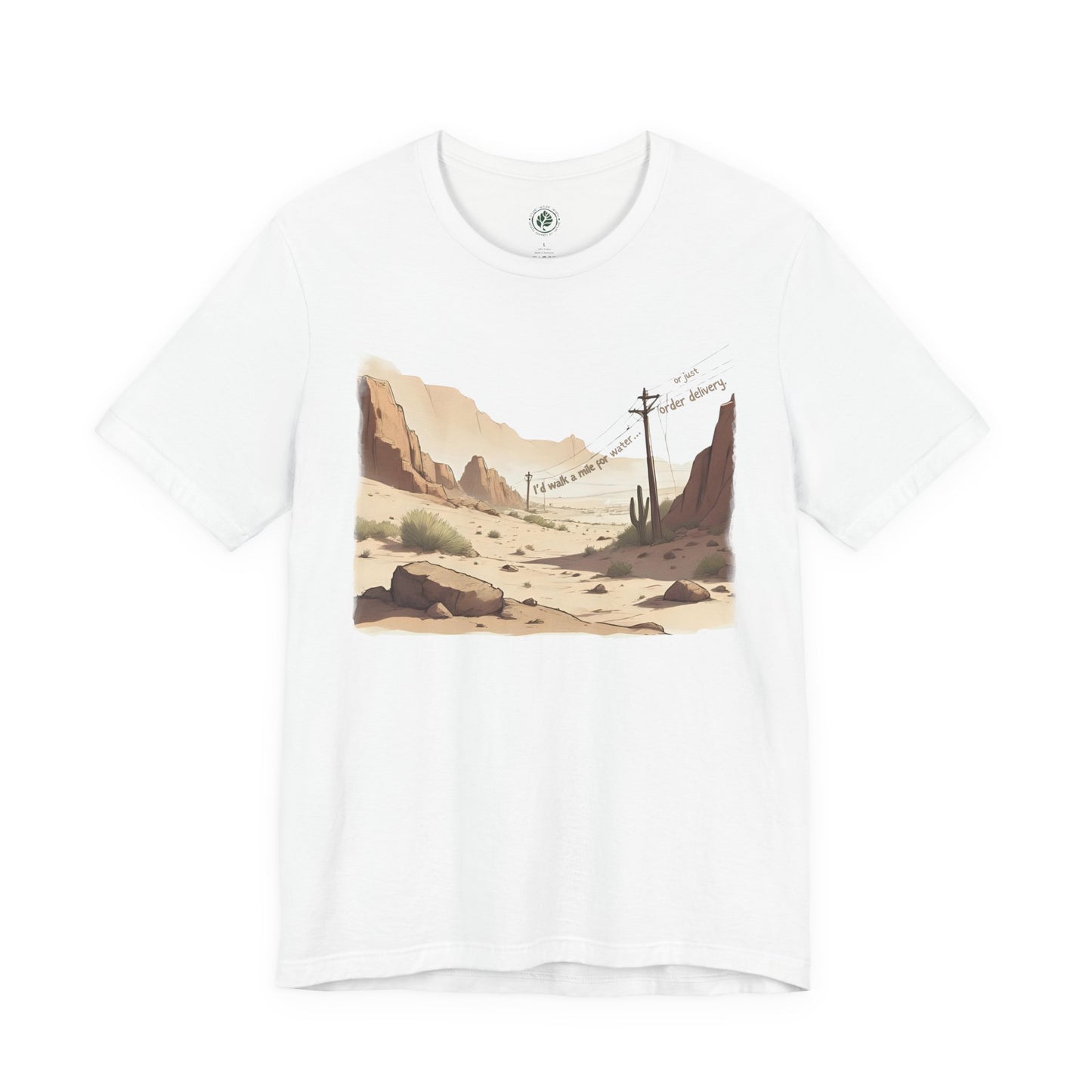 Western-inspired graphic tee in earthy tones with rustic desert landscape, telegraph poles and witty caption “I’d walk a mile for water… or just order delivery.”.