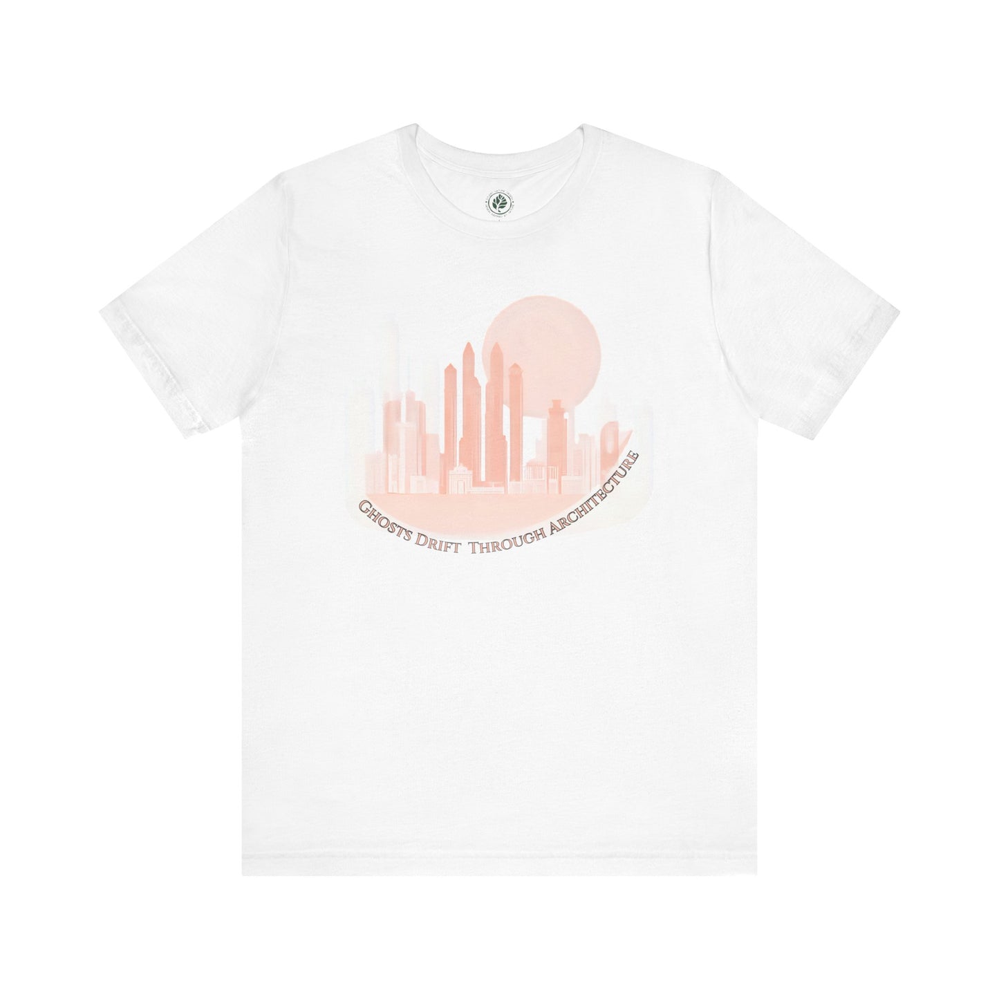 Unisex white t-shirt featuring a coral city skyline with the text “Ghosts Drift Through Architecture” beneath, symbolizing poetic urban design.