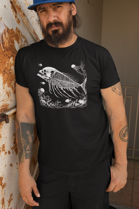 A person wearing a black t-shirt with surreal skeleton fish design, fossil-inspired artwork with skull and jellyfish, gothic.