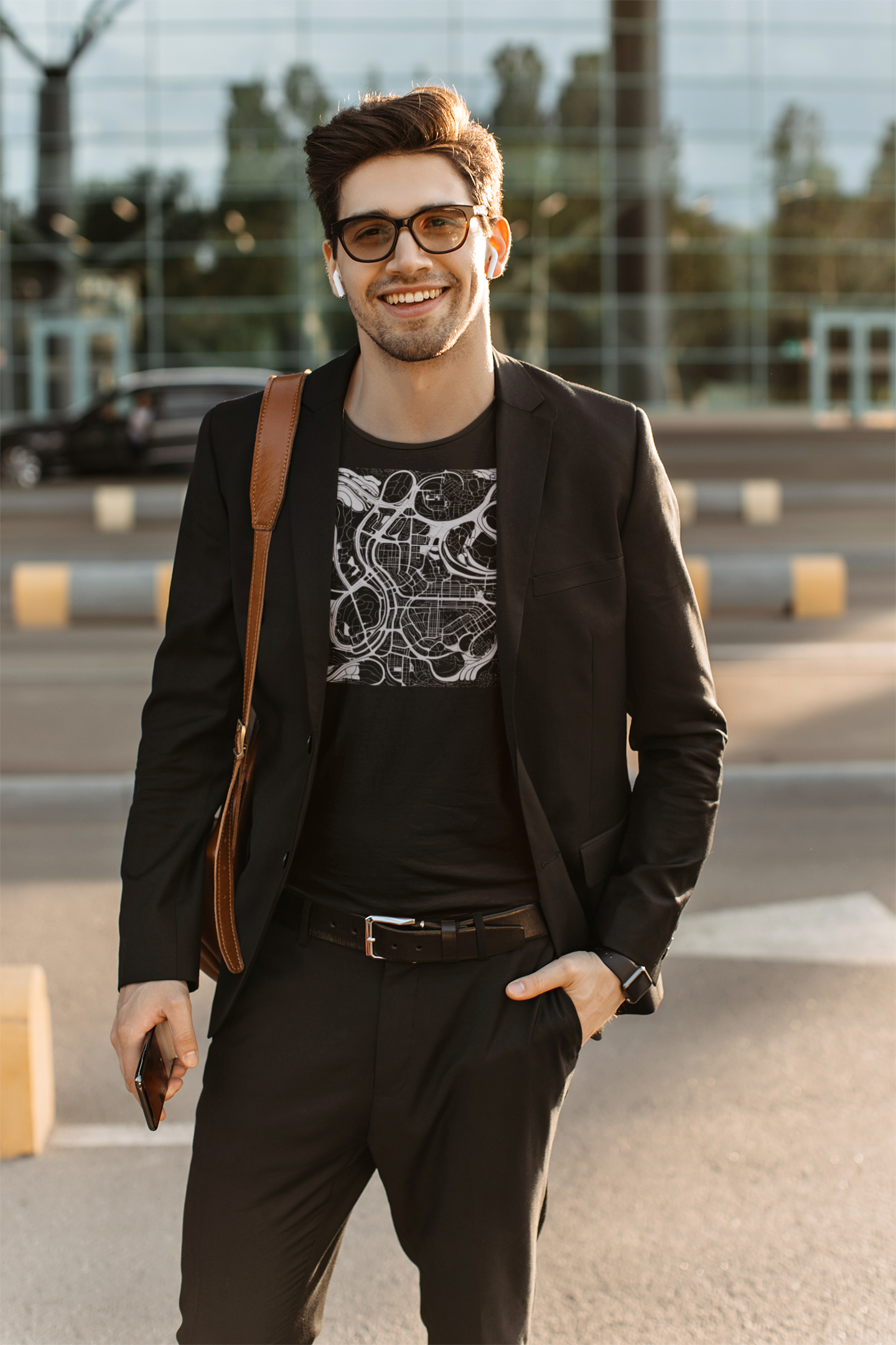Minimalist white line art of a coiled grid-like serpent on black t-shirt, symbolizing the intersection of city maps, nature, and neural networks.