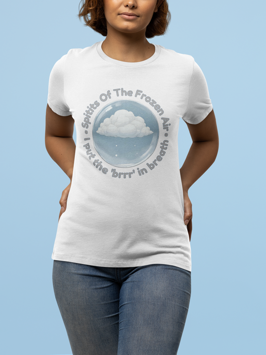 A women wearing White winter graphic t shirt with snowy cloud design and text on a light blue background