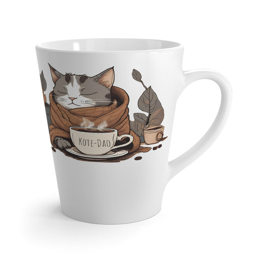 Ceramic mug featuring sleepy gray cat illustration with cozy blanket and calming design; perfect cat lover gift for tea, coffee, or cocoa moments.